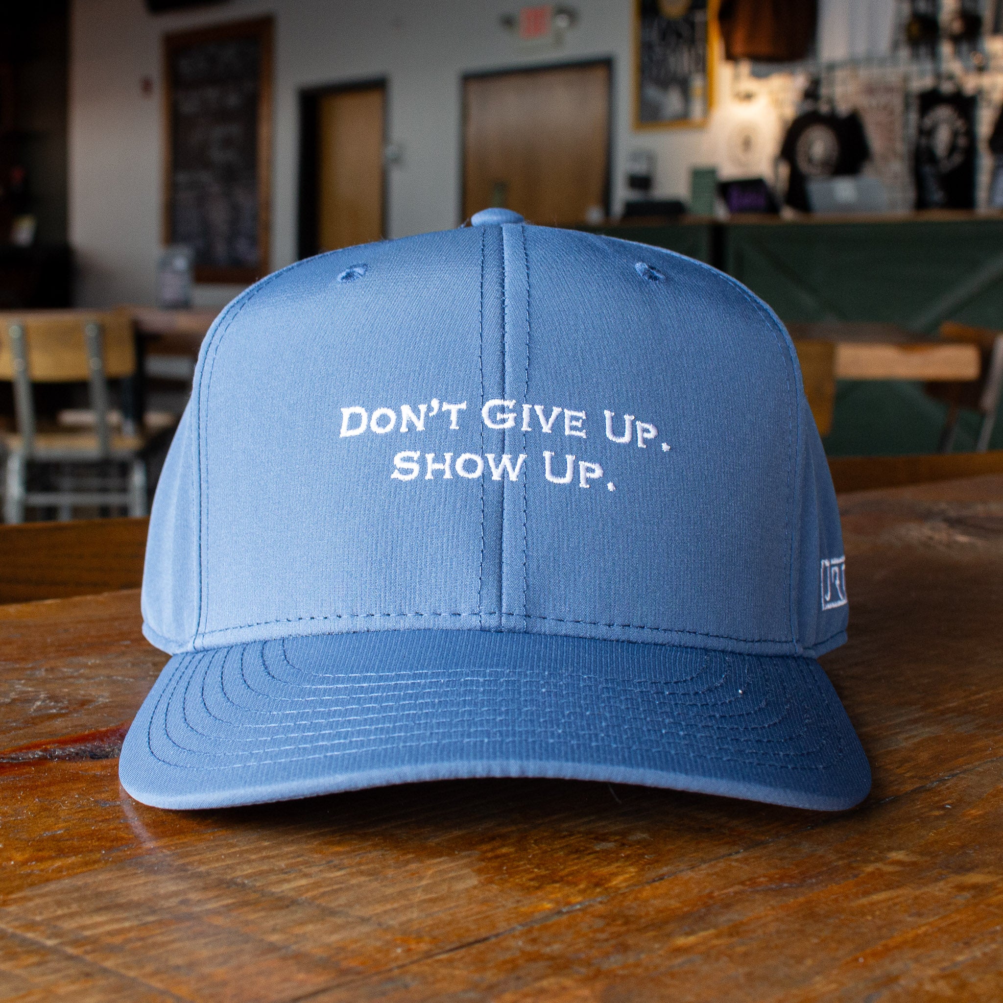 "Don't Give Up, Show Up" Blue Hat